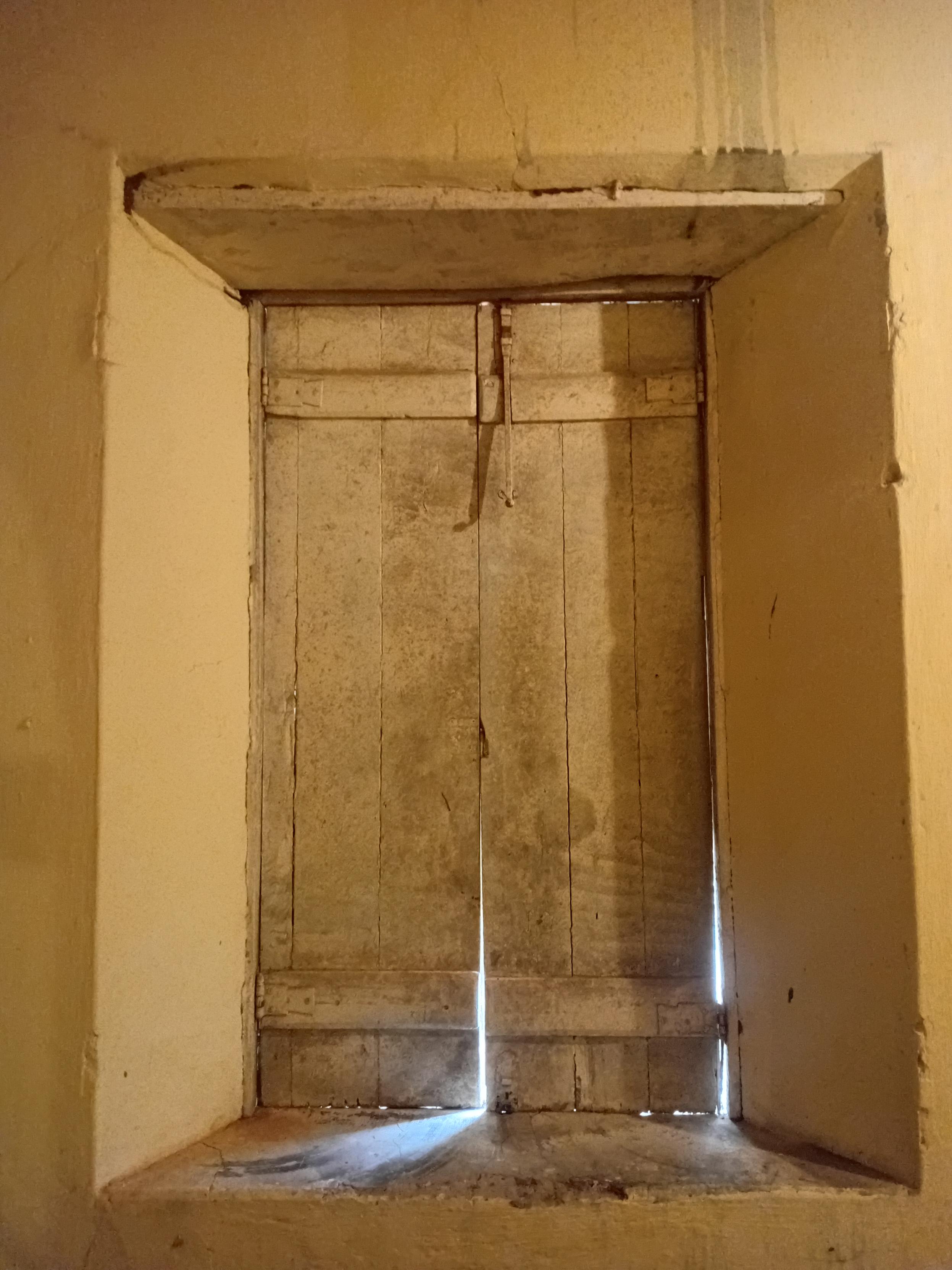 A vintage wood window divided by 2 partes.